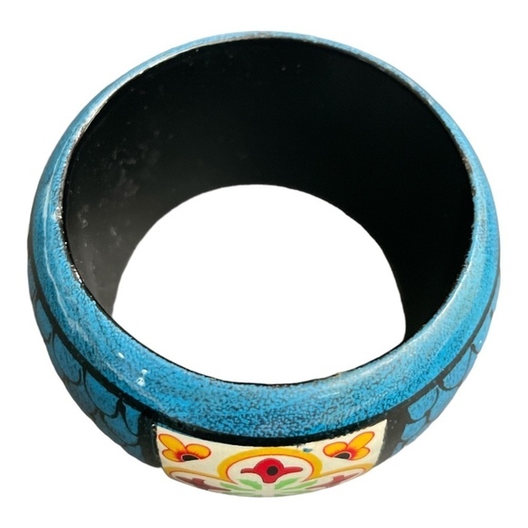 Wooden hand painted bangle. Colors of blue, red, yellow, green, and white. - Picture 4 of 8